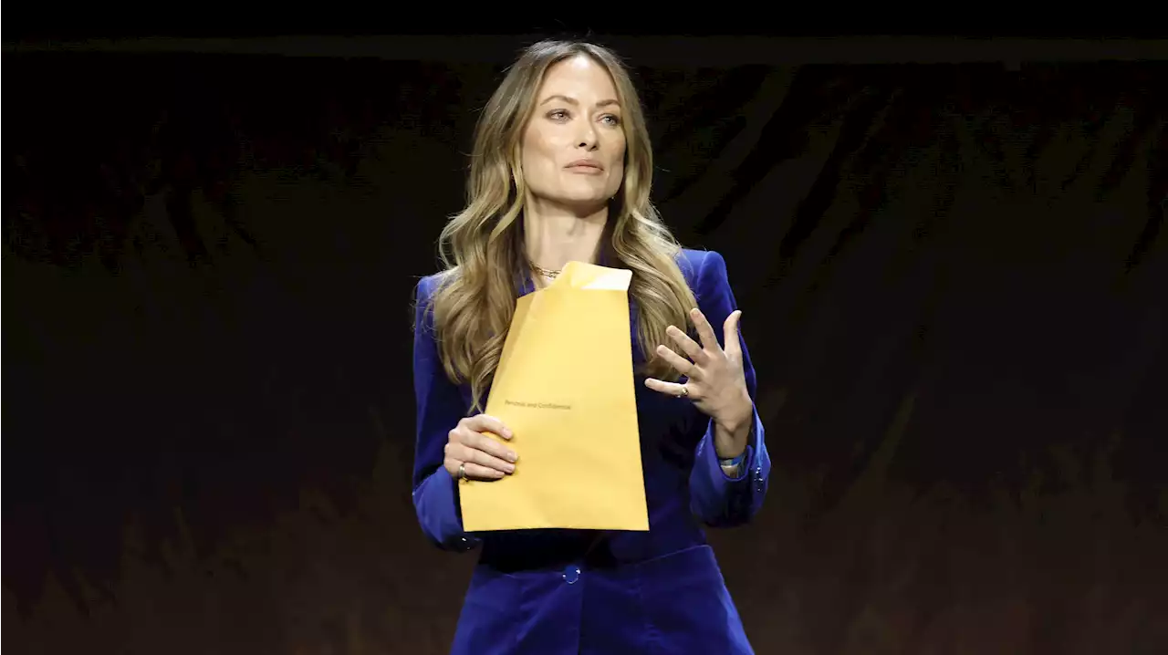 Olivia Wilde Receives Jason Sudeikis' Custody Papers Onstage at CinemaCon