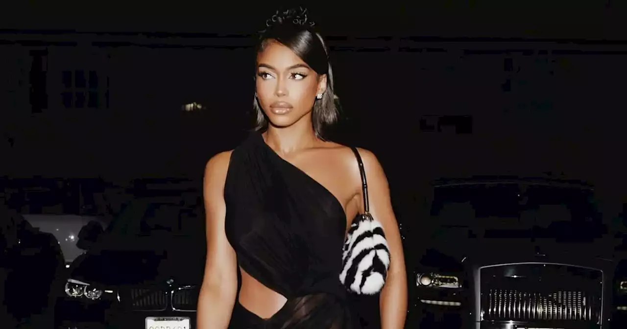 Lori Harvey Does Night Luxe in a Draped Black Cutout Dress