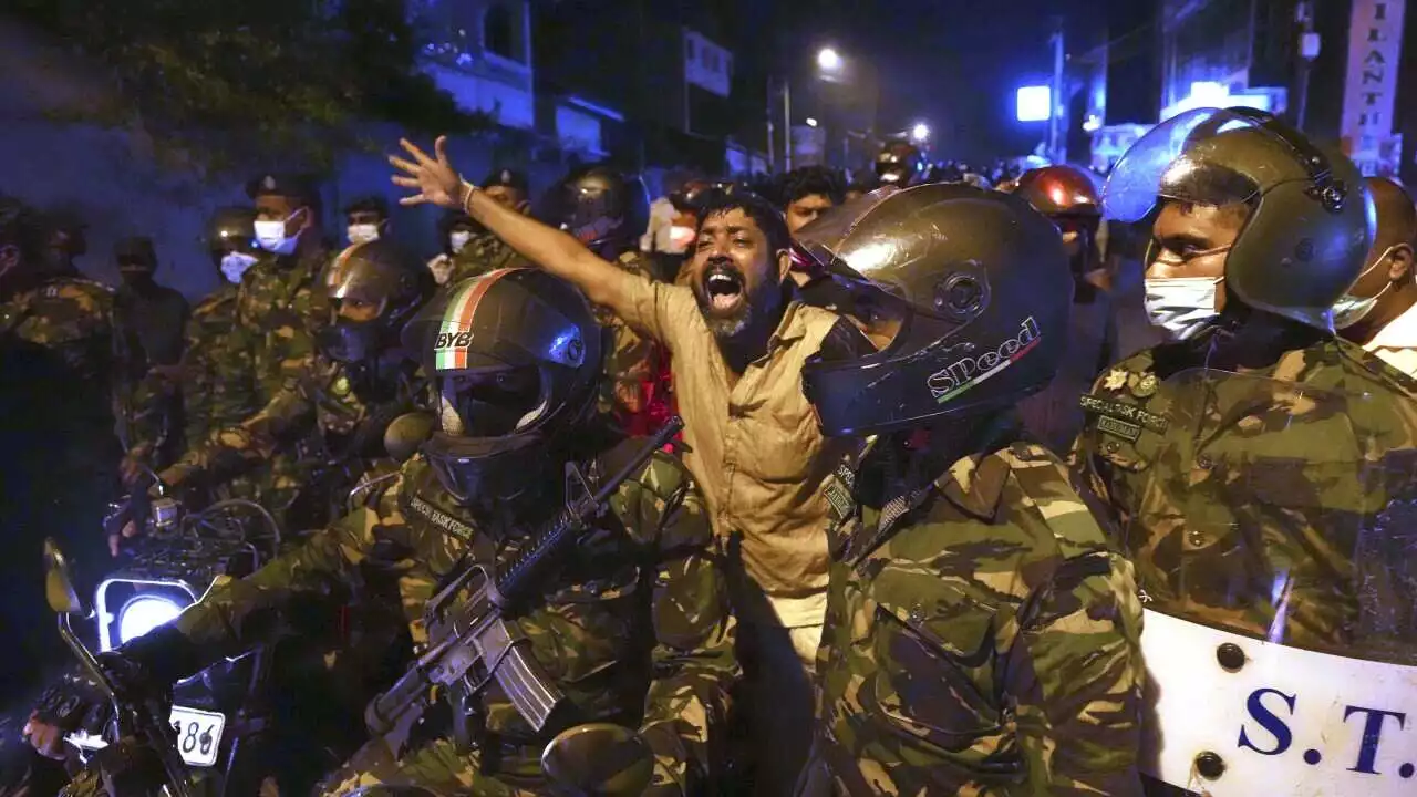 Sri Lankan government imposes curfew, blocks social media amid growing protests