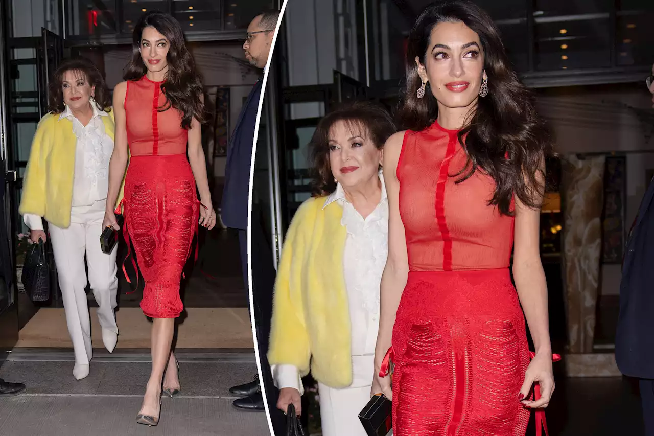 Amal Clooney shines in sheer red dress in NYC