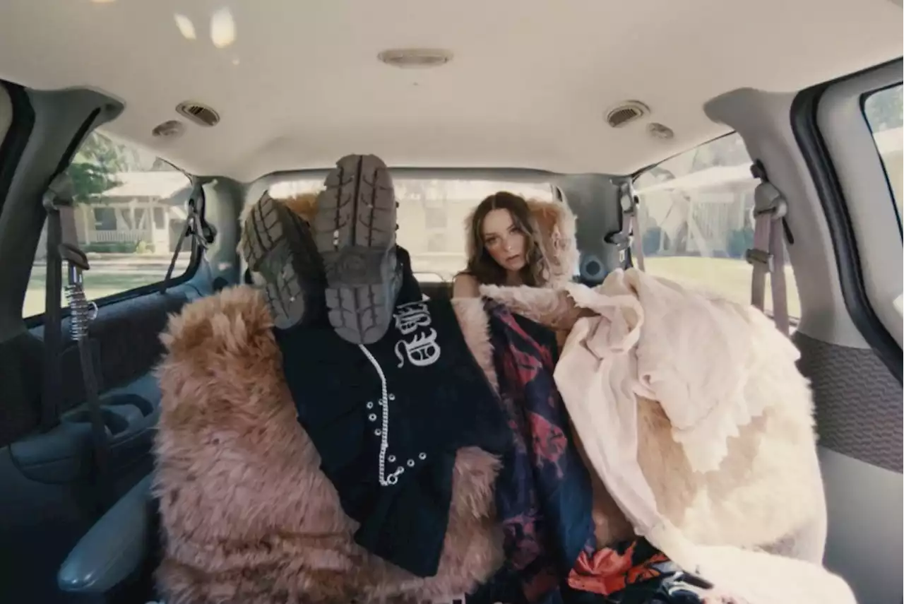 Holly Humberstone Floats in a Self-Driving Minivan in Carefree 'Sleep Tight' Video