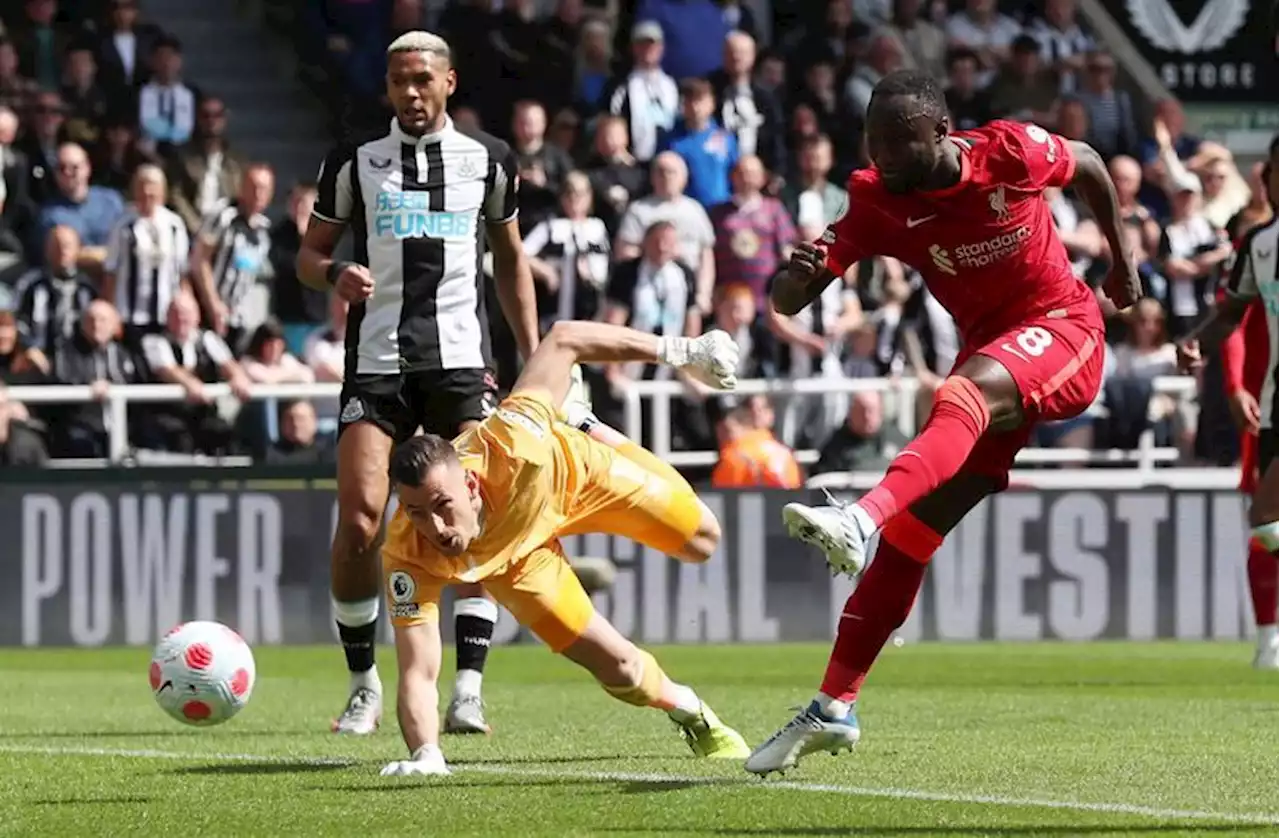 Soccer-Liverpool keep pressure on Man City with 1-0 win at Newcastle