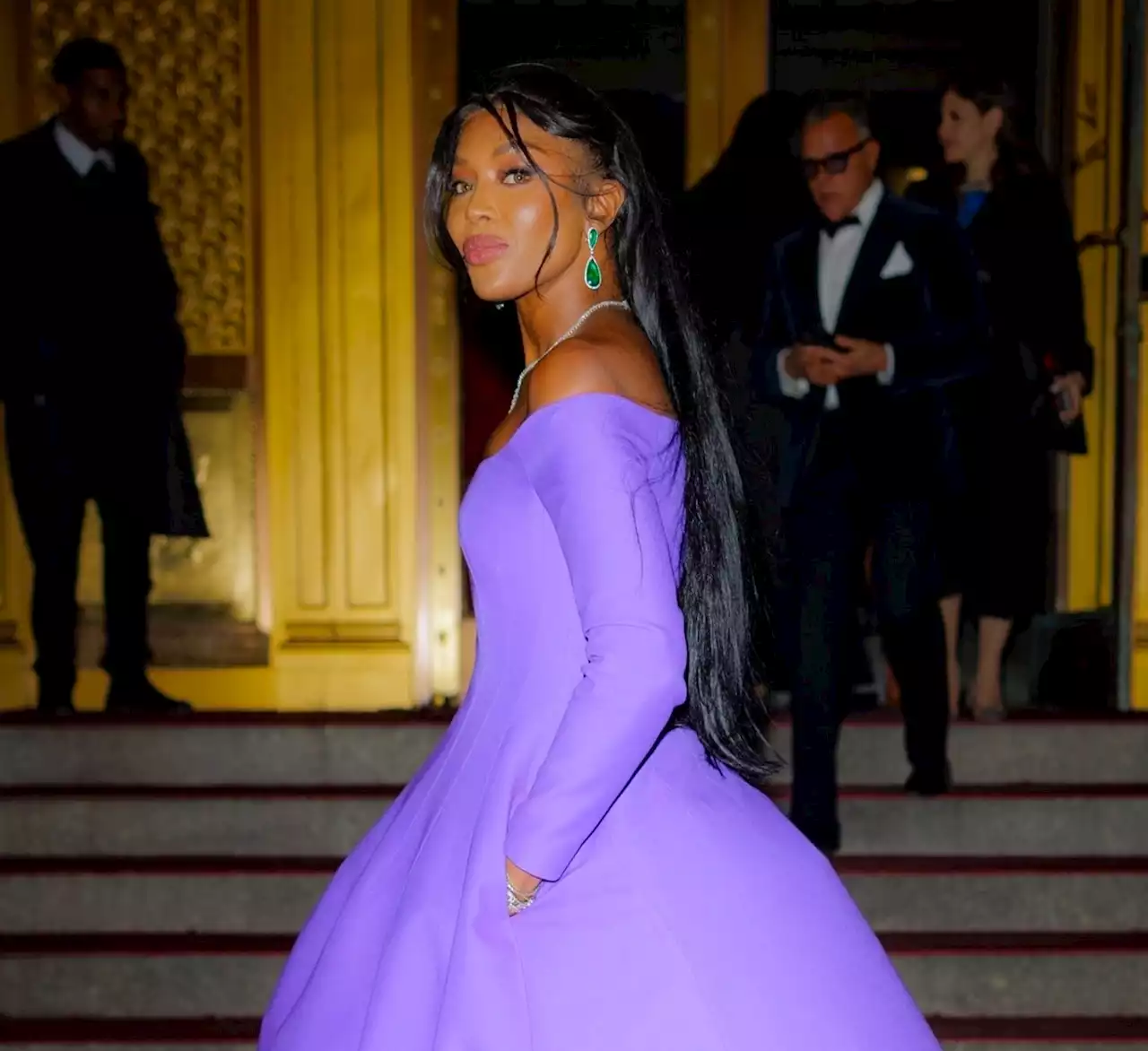 Naomi Campbell Showcases Her Royal Status in Purple