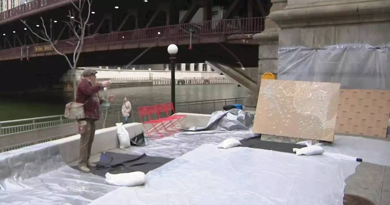 Artist uses unusual fly casting style to paint Chicago River