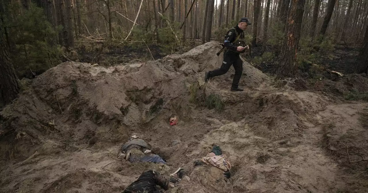 Ukrainian mayor found tortured and executed beside family in shallow grave