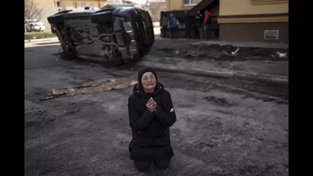 AP PHOTOS on Day 40: Ukrainians grieve, attend funerals