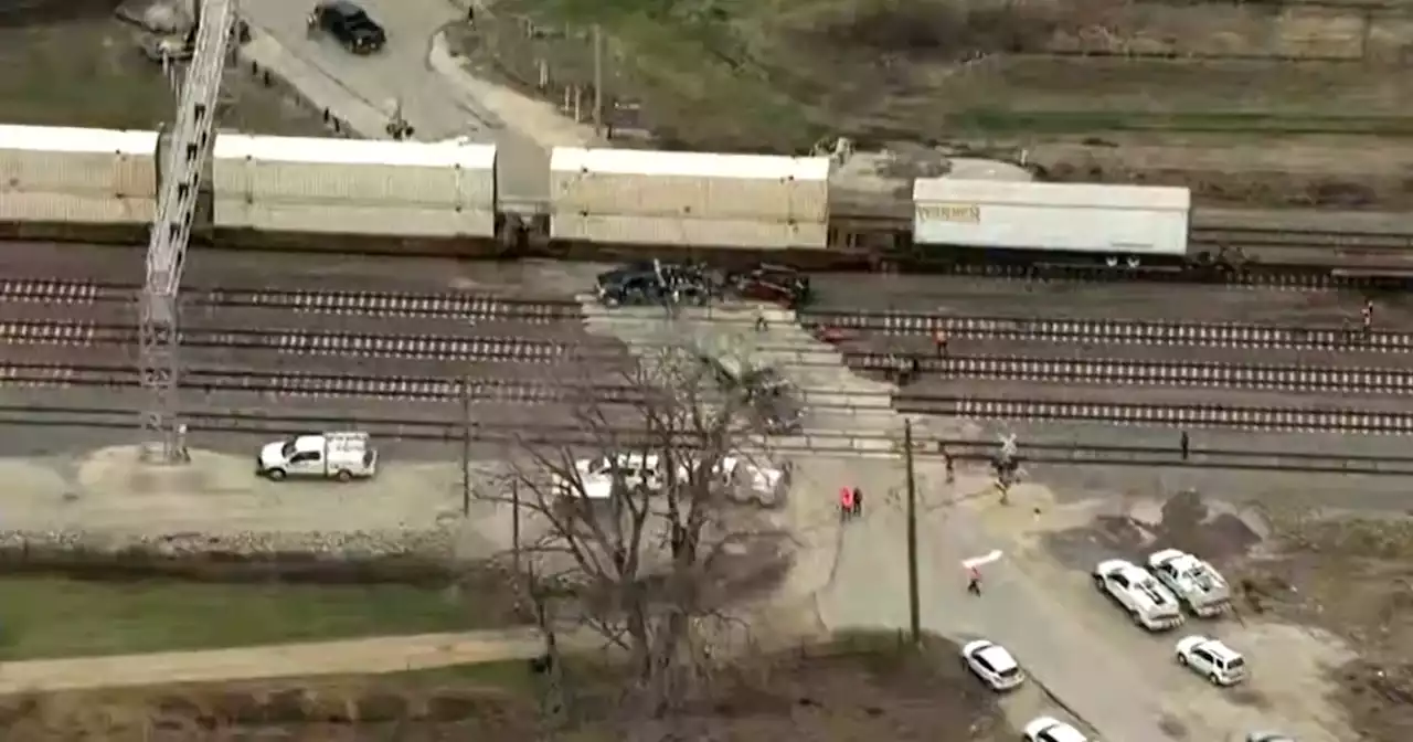 Man dead after freight train hits vehicle in Will County