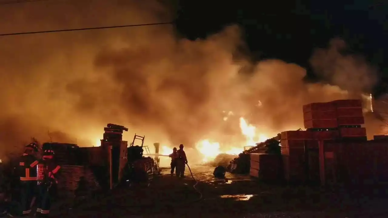 Firefighters battling Johnson County pallet fire take shelter after spotting funnel cloud