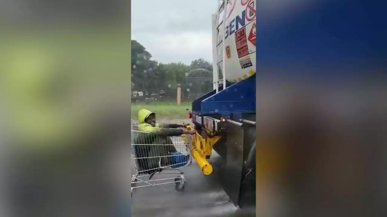 Trolley dash daredevil grabs a ride on speeding fuel tanker