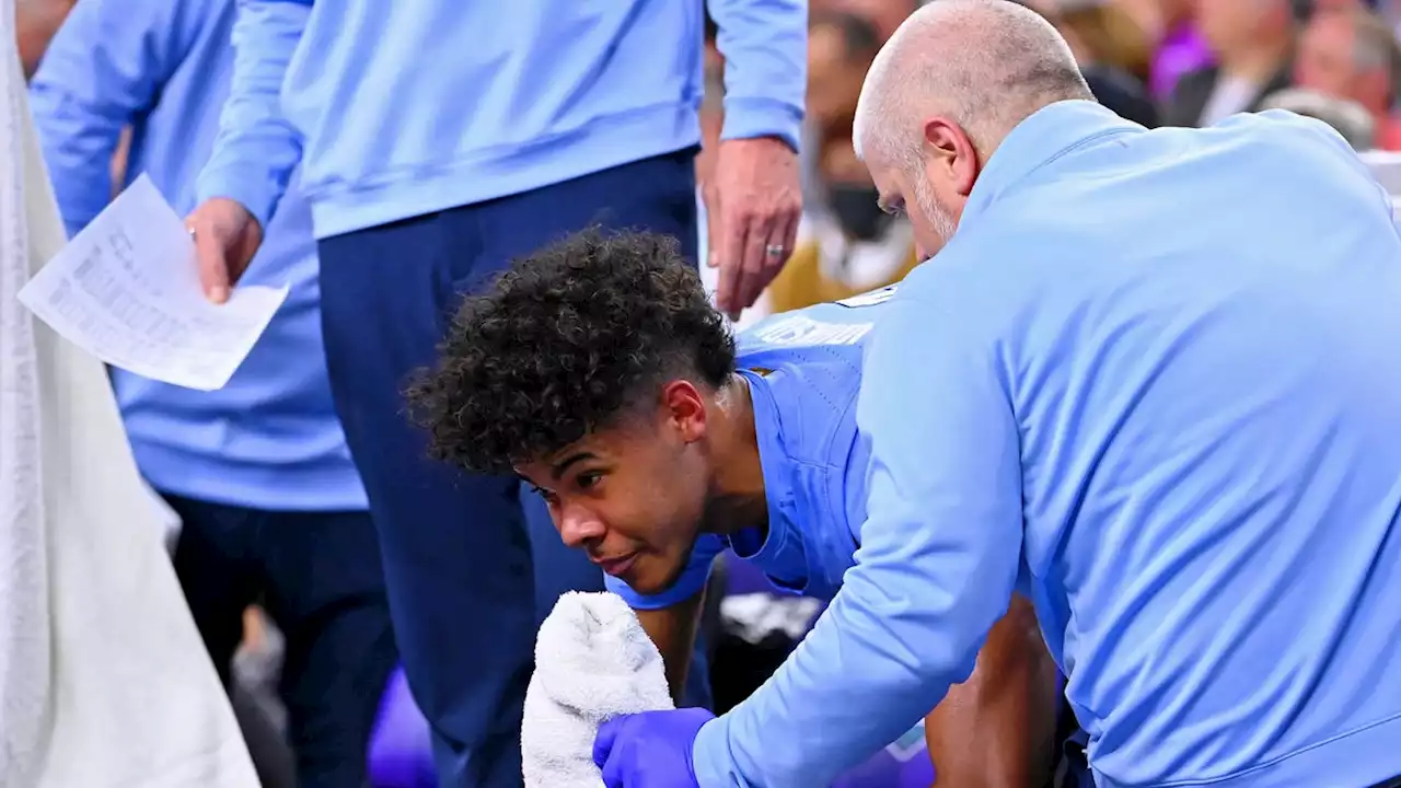 UNC guard Puff Johnson vomits, recovers, returns after taking blow to stomach