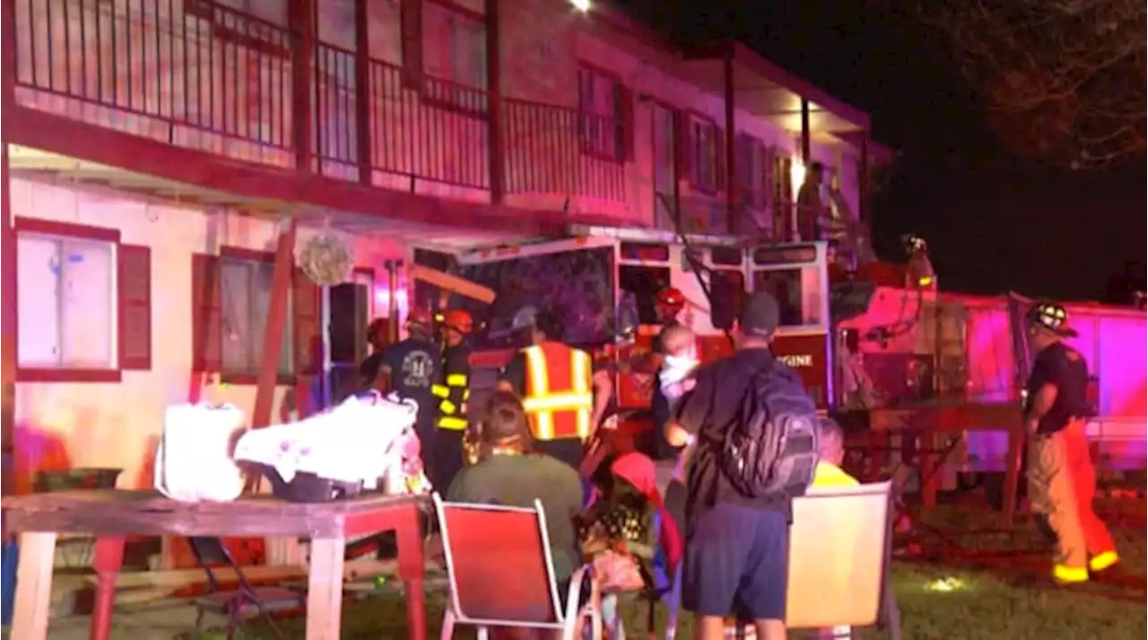 SAFD: Fire truck crashes into apartment building after being hit by sedan; 17 residents displaced