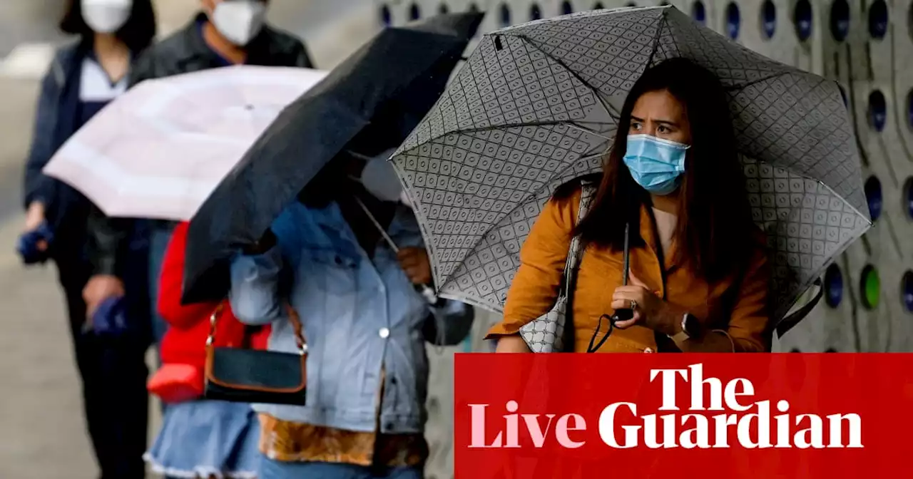 Australia news live updates: severe weather warnings in NSW as heavy rain lashes Sydney, petrol flows into road