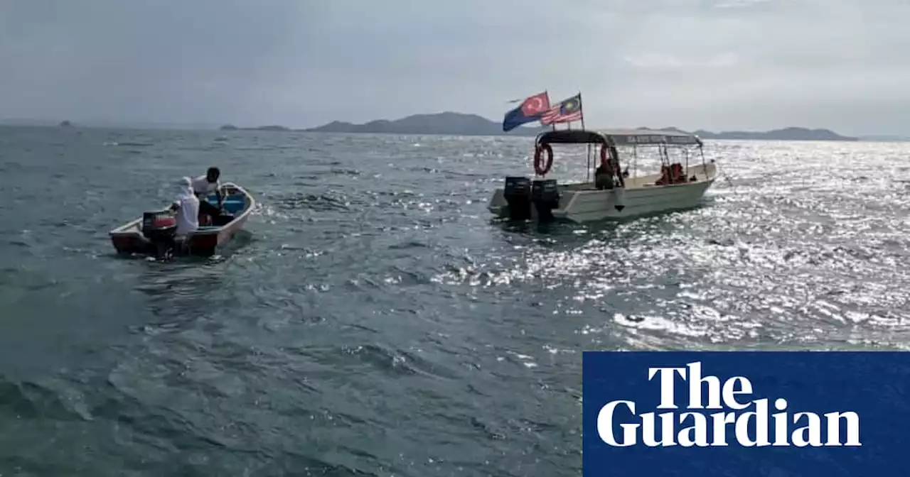 Two Britons are among four tourists missing after diving trip in Malaysia