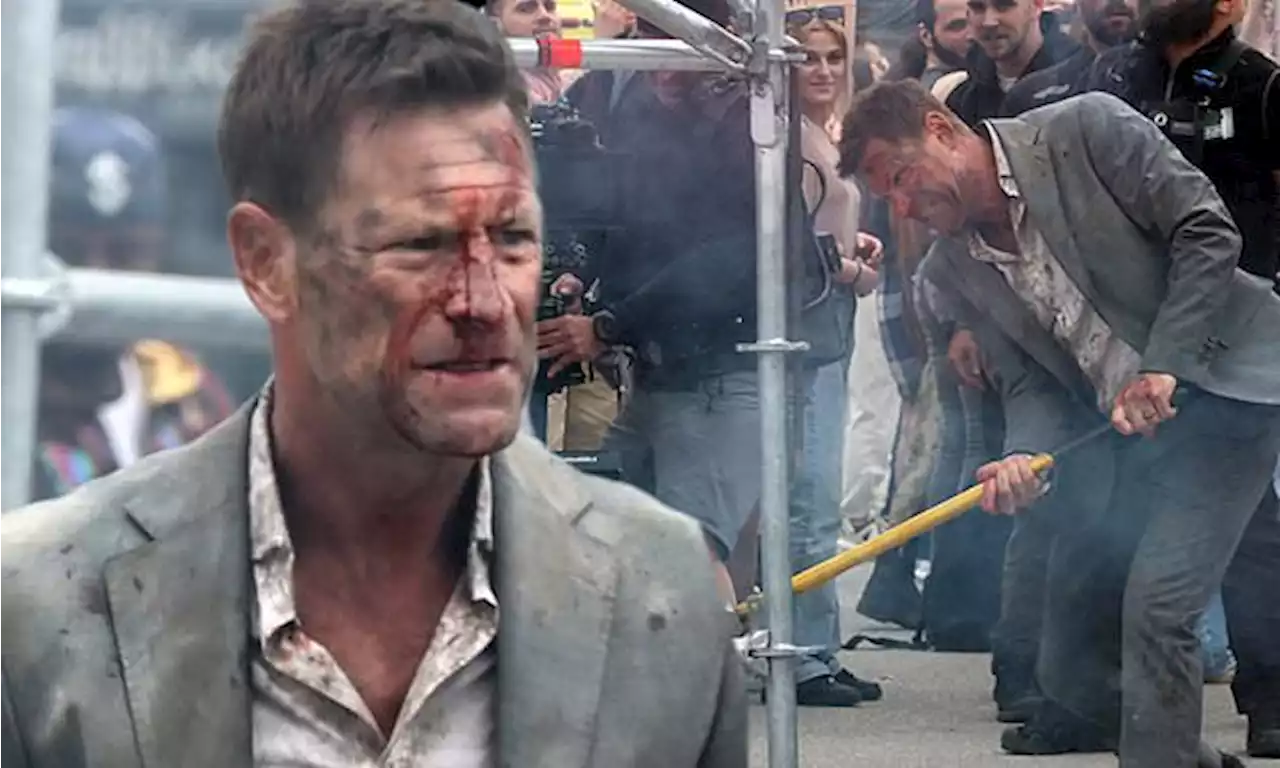 Aaron Eckhart gets battered and bloodied filming The Bricklayer