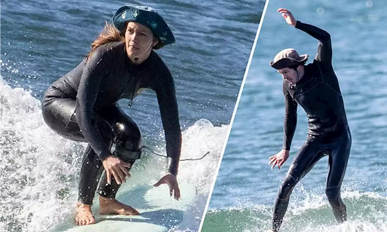 Adam Brody and Leighton Meester catch waves while surfing in Malibu