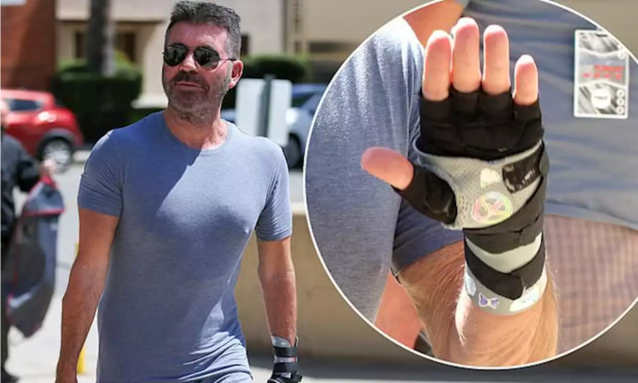 Simon Cowell shows off his svelte physique at America's Got Talent