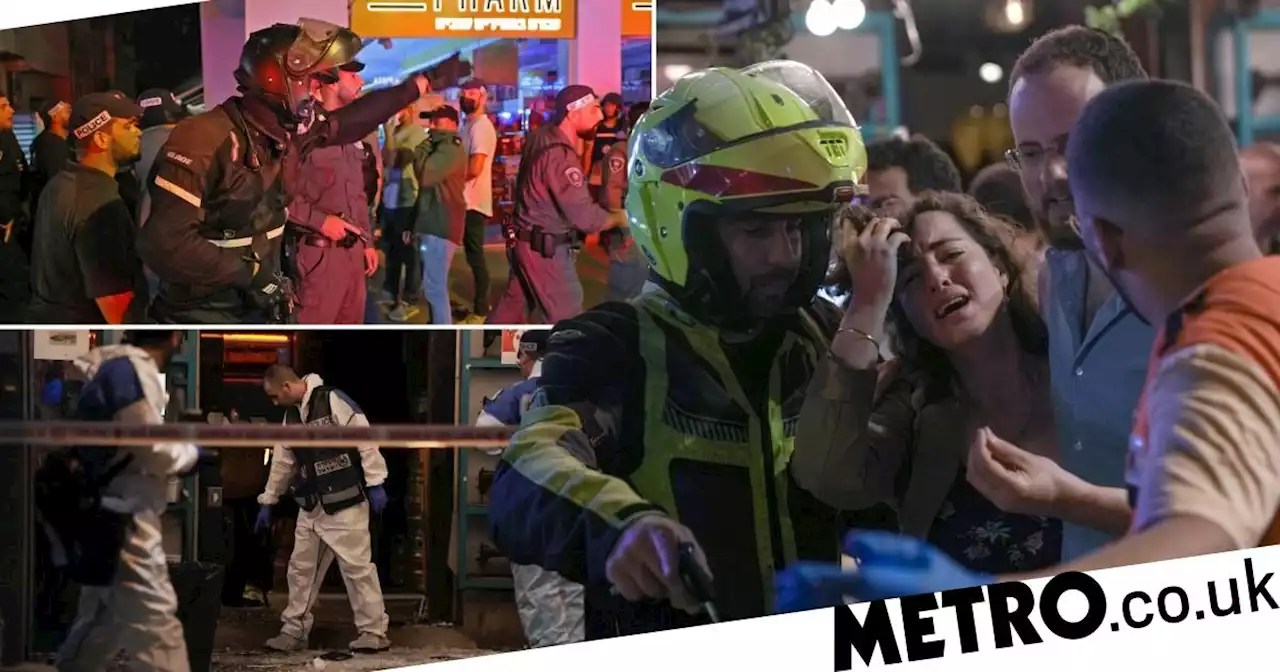 Two killed and several injured as gunman on run after shooting at Tel Aviv bar