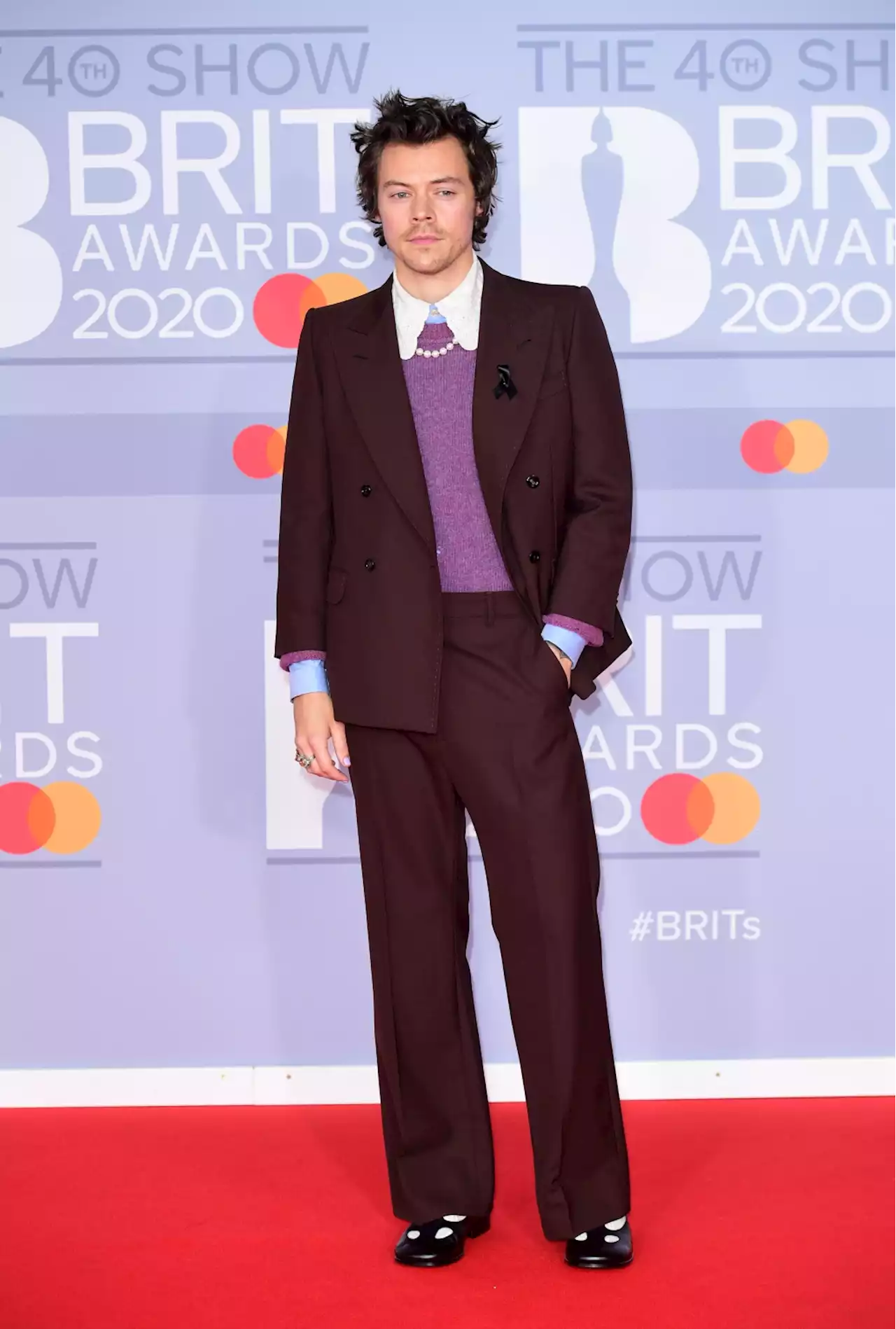 A Look at Harry Styles’ Most Fashionable Moments