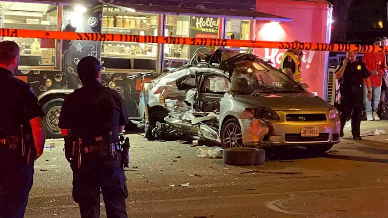 11 injured as car crashes into food truck