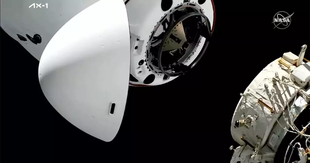 Commercial crew docks with International Space Station after smooth rendezvous