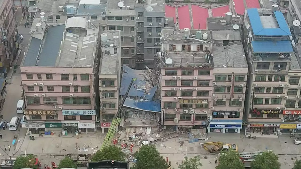 Woman rescued 50 hours after China building collapse