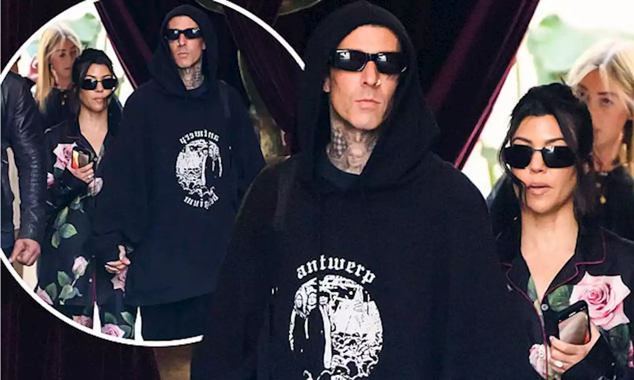 Kourtney Kardashian and Travis Barker enjoy a stroll around Milan