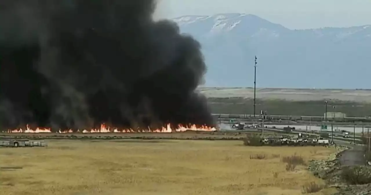 Grass fire burning off I-80 near Great Salt Lake