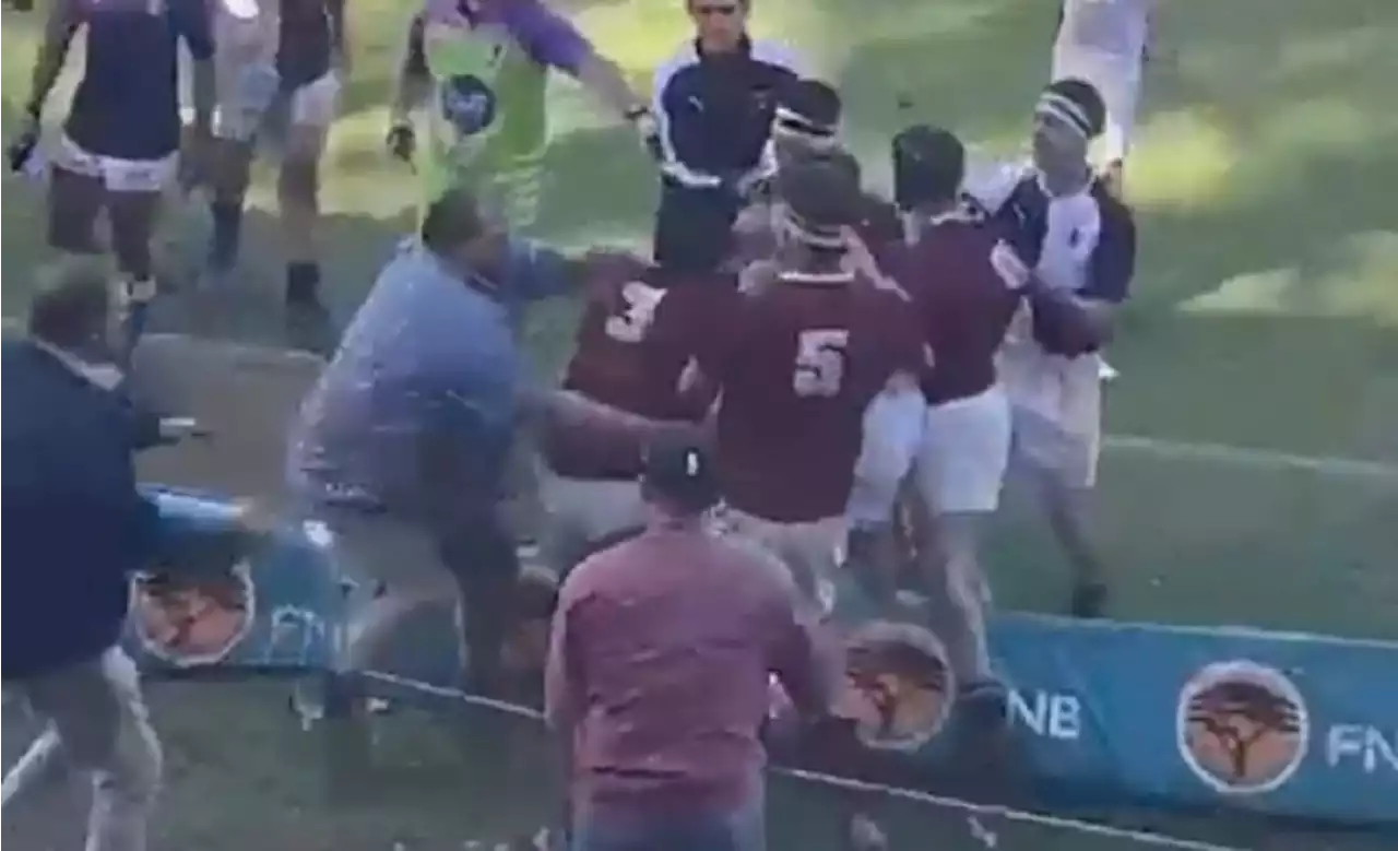 Watch: Parent manhandles schoolboy, sparks brawl