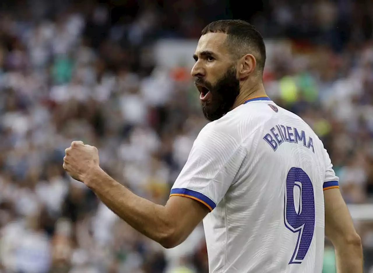 Soccer-Brilliant Benzema guides Real Madrid to league title