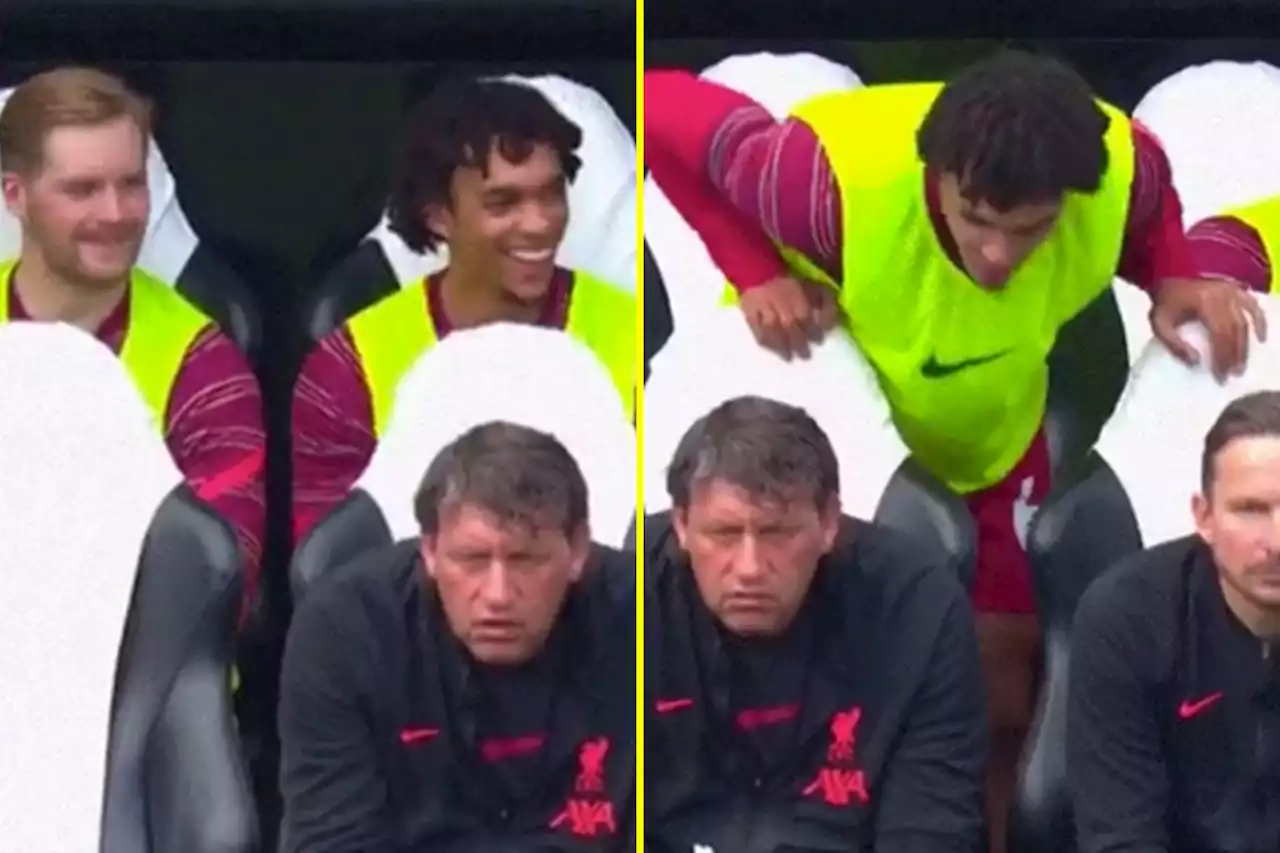 Alexander-Arnold laughs at free-kick from Henderson as he watches from Liverpool bench