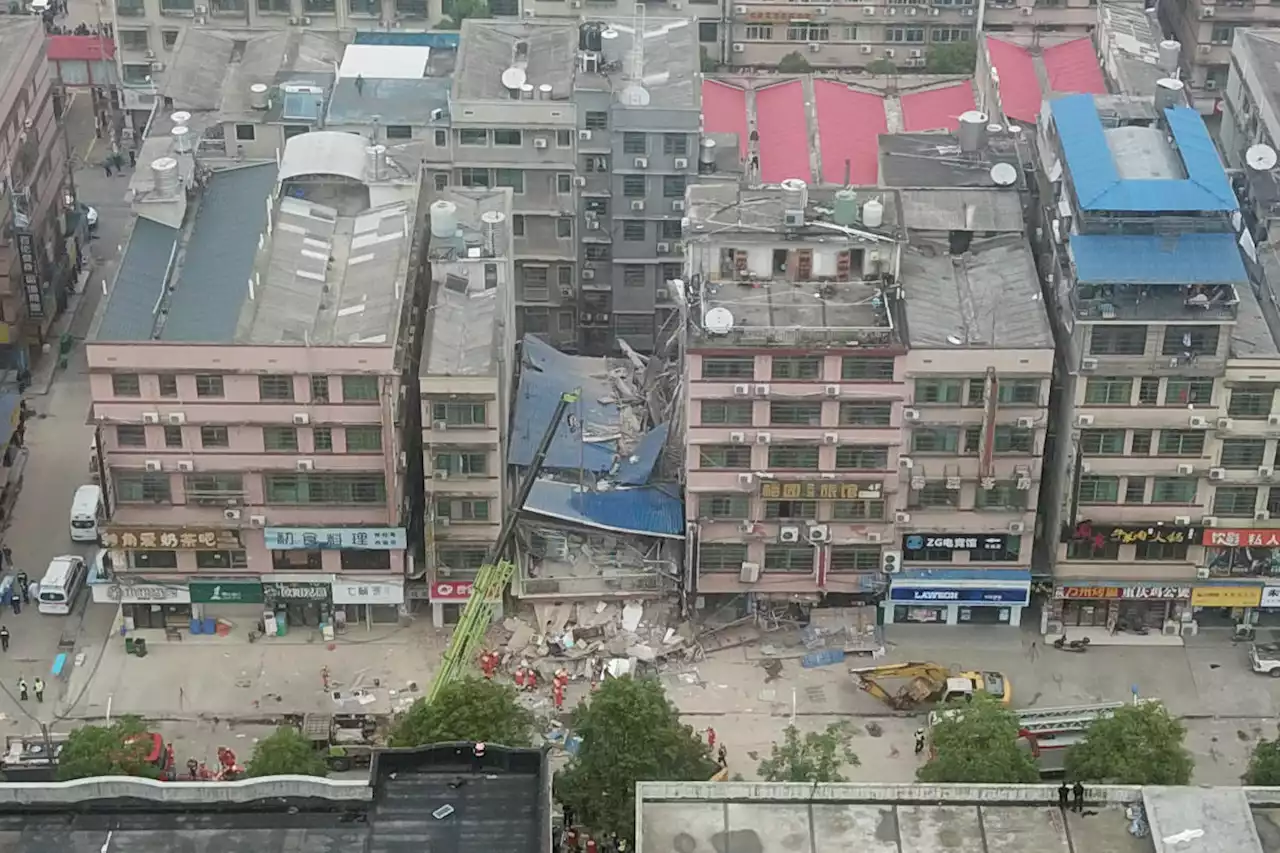 Woman rescued 50 hours after China building collapse