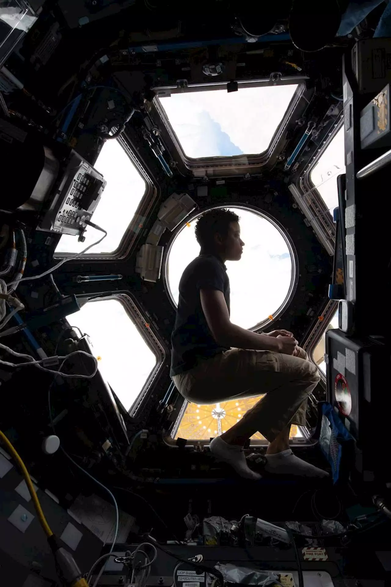 Astronaut Jessica Watkins Floats Above the Earth in the Space Station's Cupola