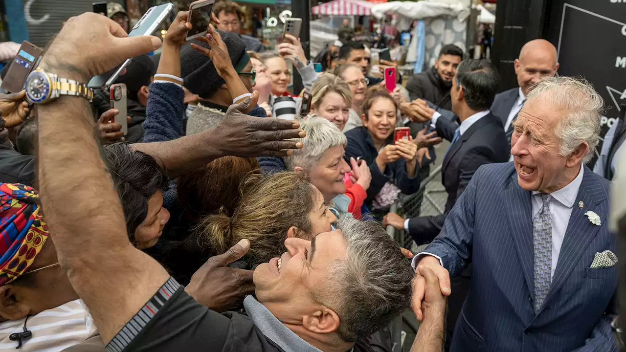 Prince Charles mobbed by crowd, in good spirits following delivery of Queen's Speech at opening of Parliament