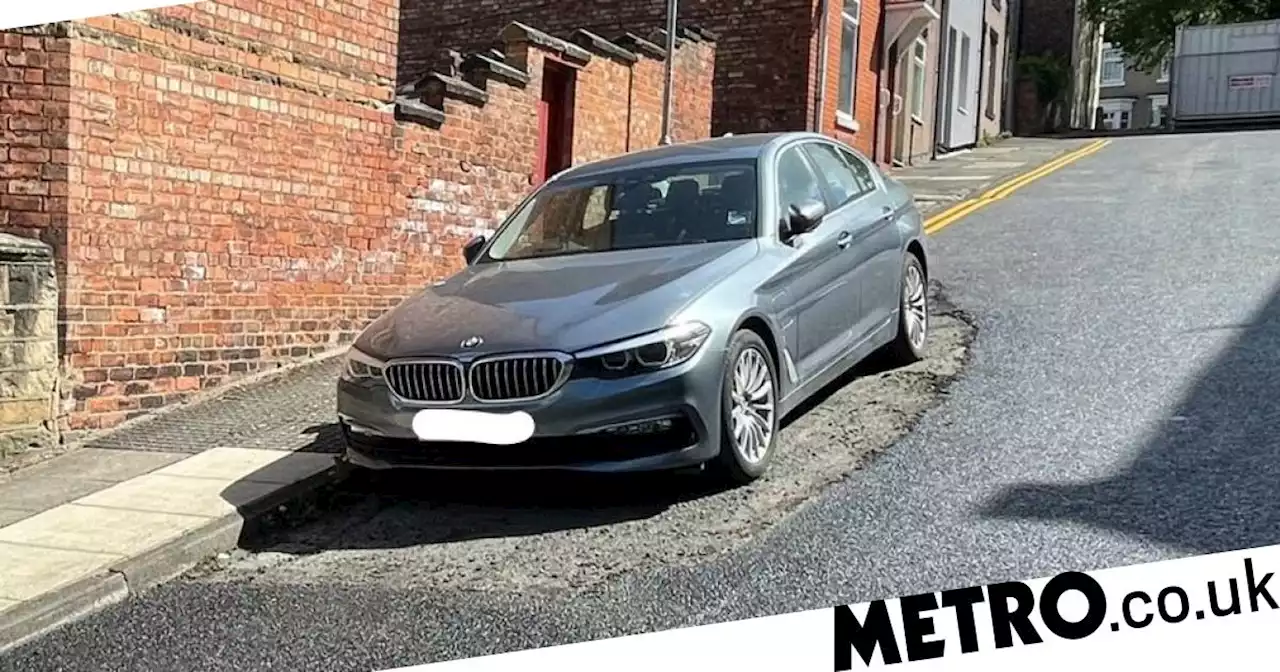 Road resurfaced around BMW after driver failed to move their car