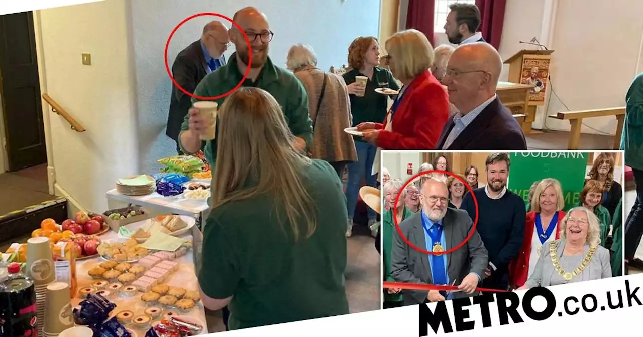 Tory council leader tucks into cherry bakewell buffet at food bank