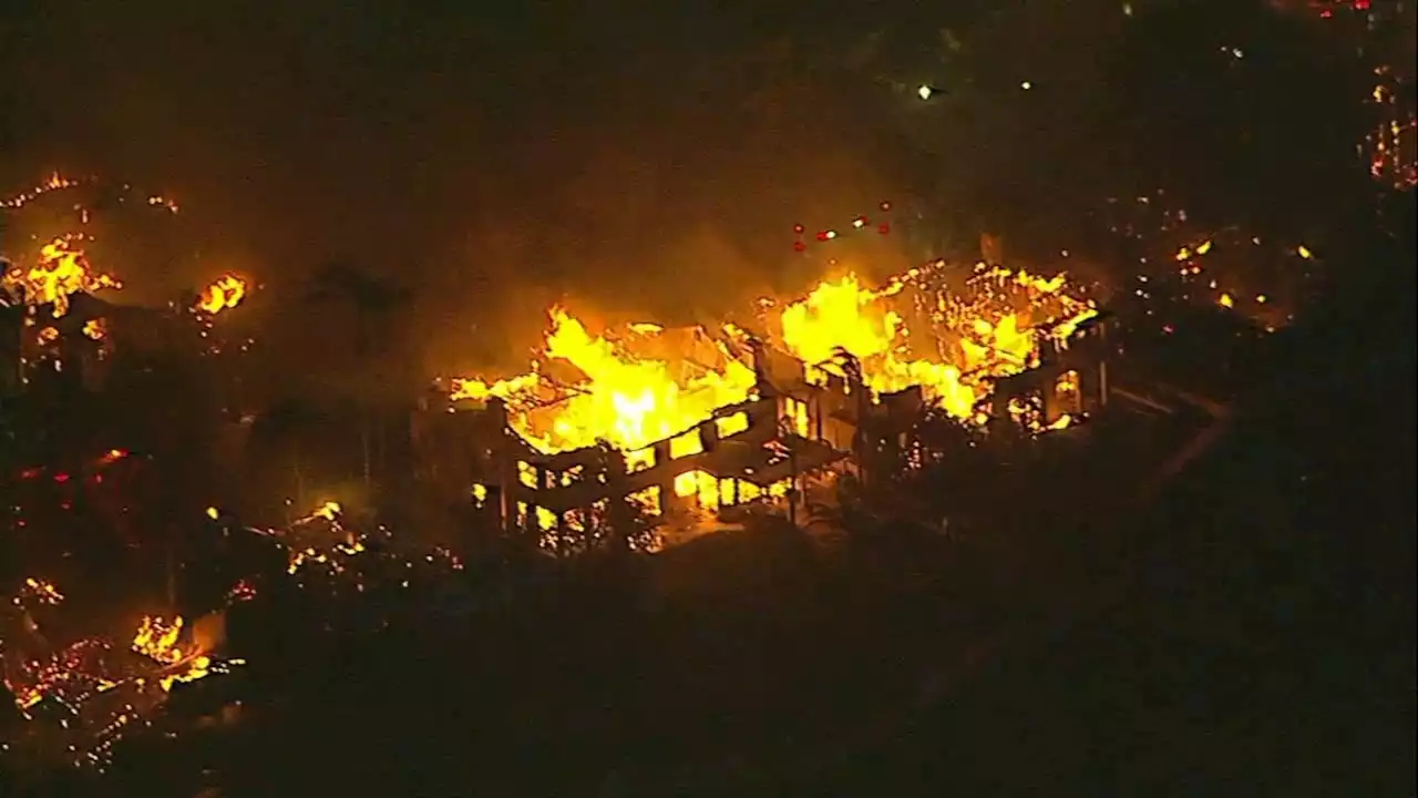 At least 20 homes destroyed in SoCal brush fire, fire chief says