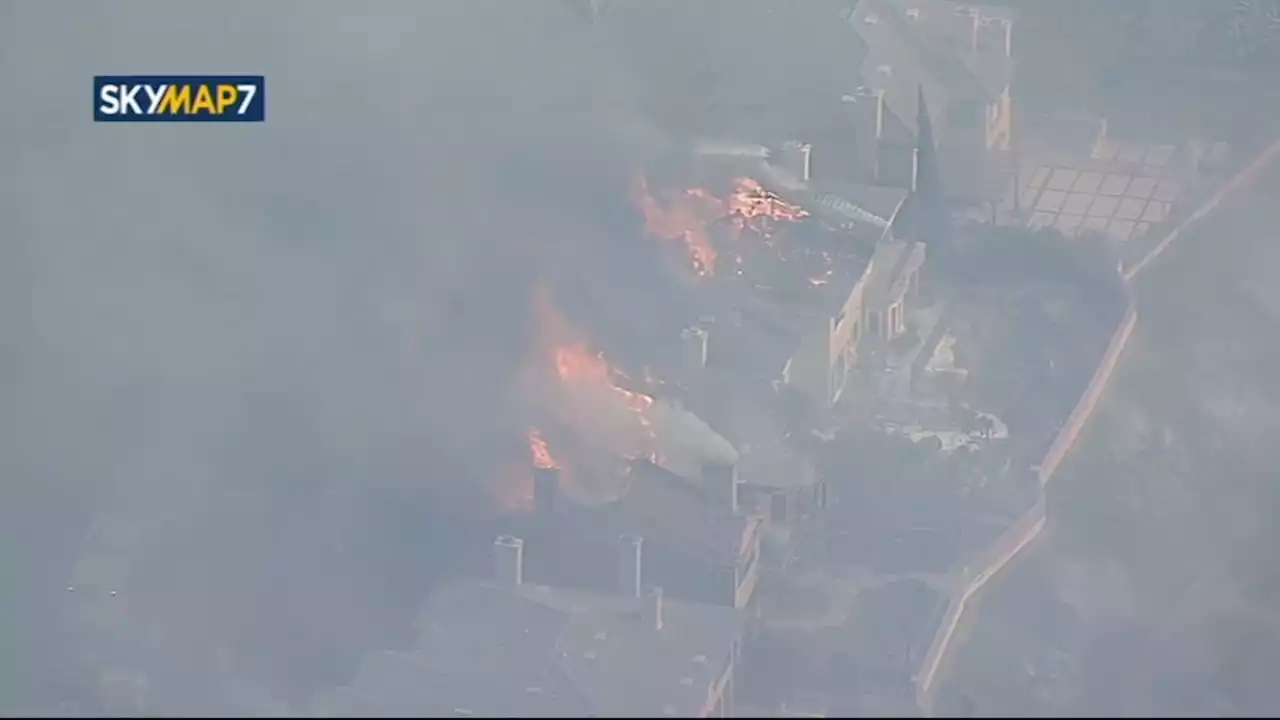 LIVE: At least 13 homes up in flames as SoCal brush fire explodes in size