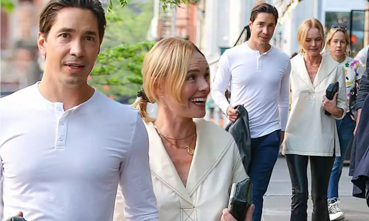 Kate glows with happiness as she holds hands with Justin Long in NYC