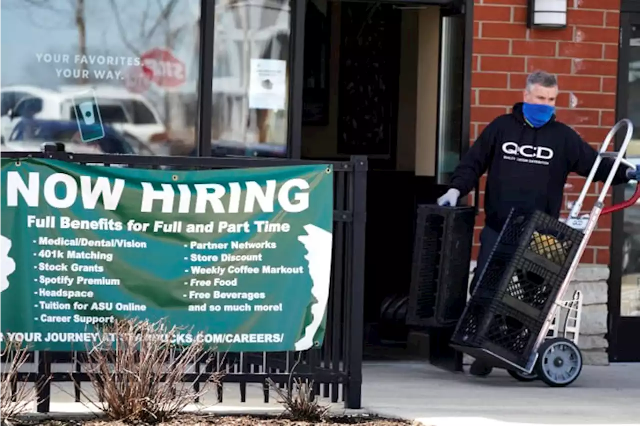 Slightly more Americans seek jobless aid last week