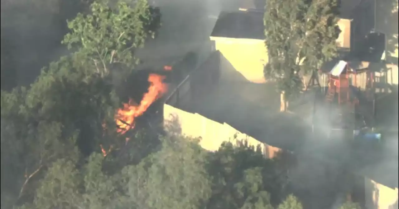 Fire crews knockdown brush fire threatening several homes in San Pedro