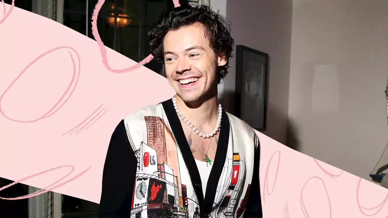 Fans are losing it over this behind-the-scenes clip of shirtless Harry Styles cuddling a baby