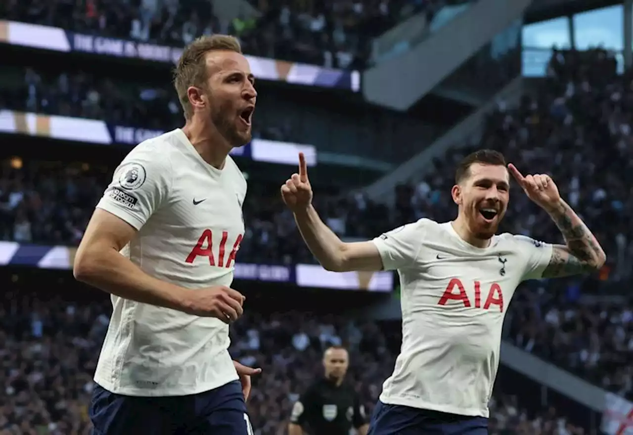 Soccer-Kane double fires Tottenham to vital win over Arsenal