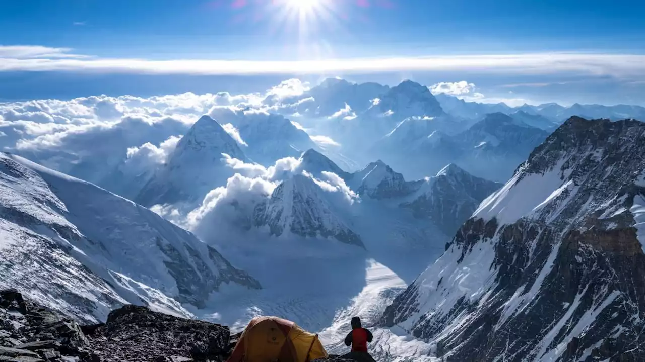 Records tumble as climbers race for highest peaks