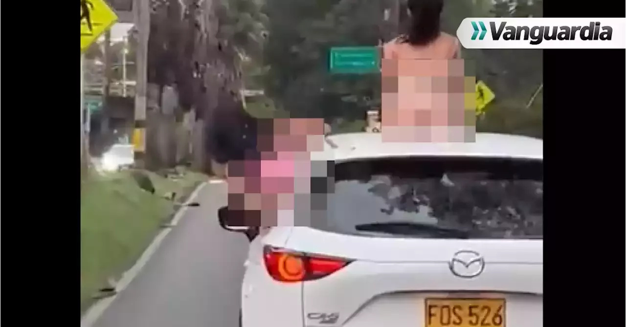 Polémica por video de dos mujeres sin ropa bailando encima de un carro |  Colombia | Head Topics