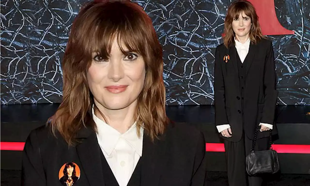 Winona channels Diane in men's suit at Stranger Things premiere