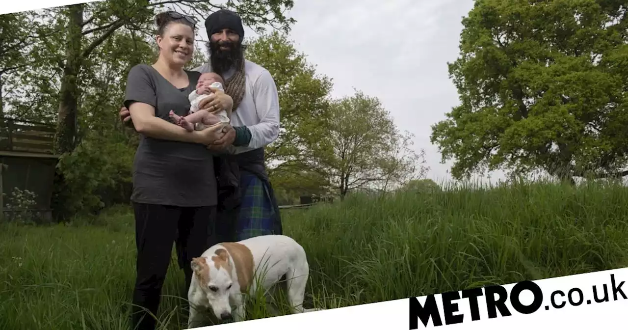 Man walking Britain's coastline has baby with woman he met along way