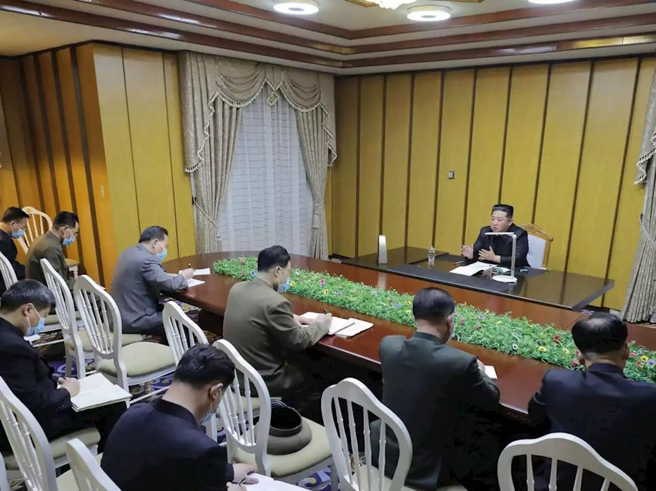 North Korea's Kim says COVID 'great turmoil,' 21 new deaths reported