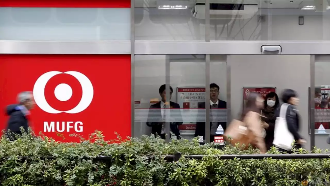 Japan's top lender MUFG expects profit fall after record year