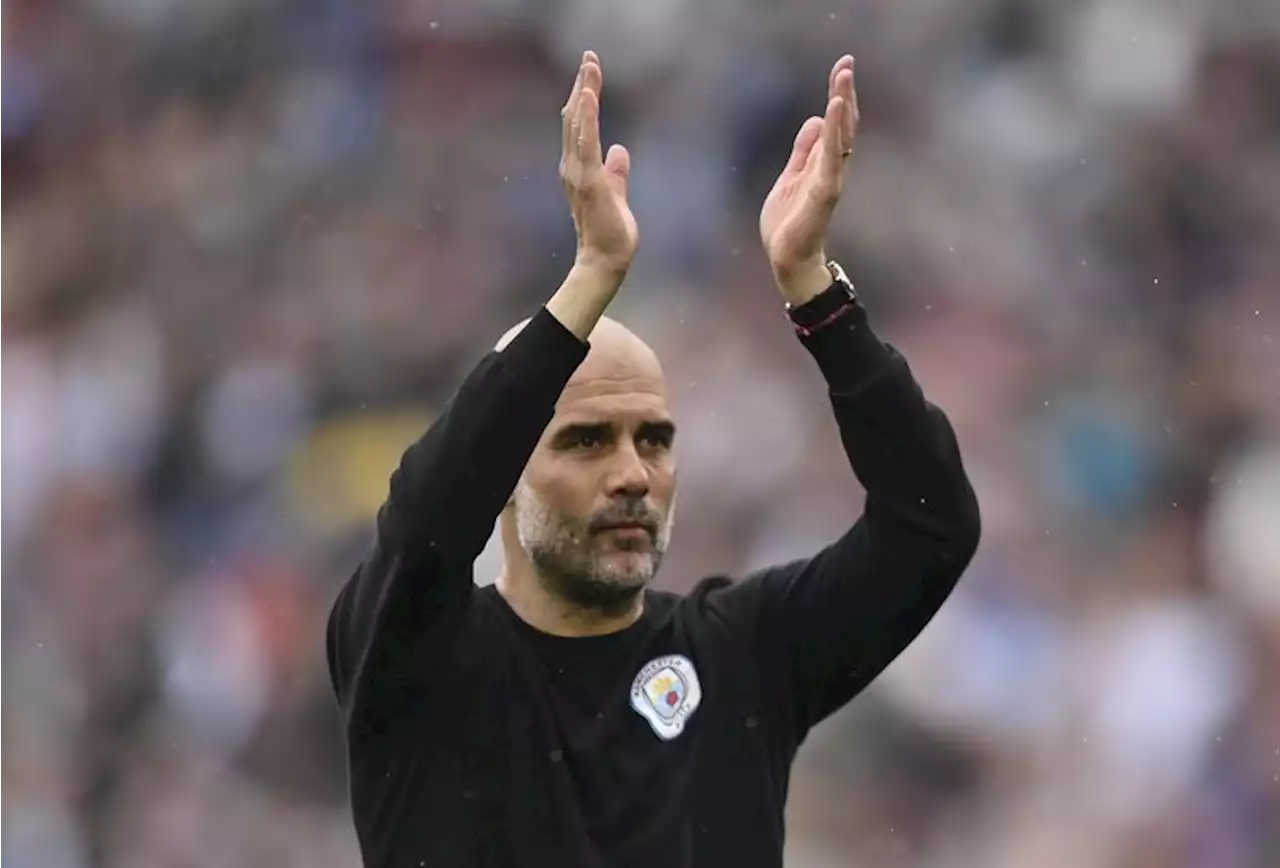 Soccer-Guardiola happy as title in City's hands despite West Ham draw