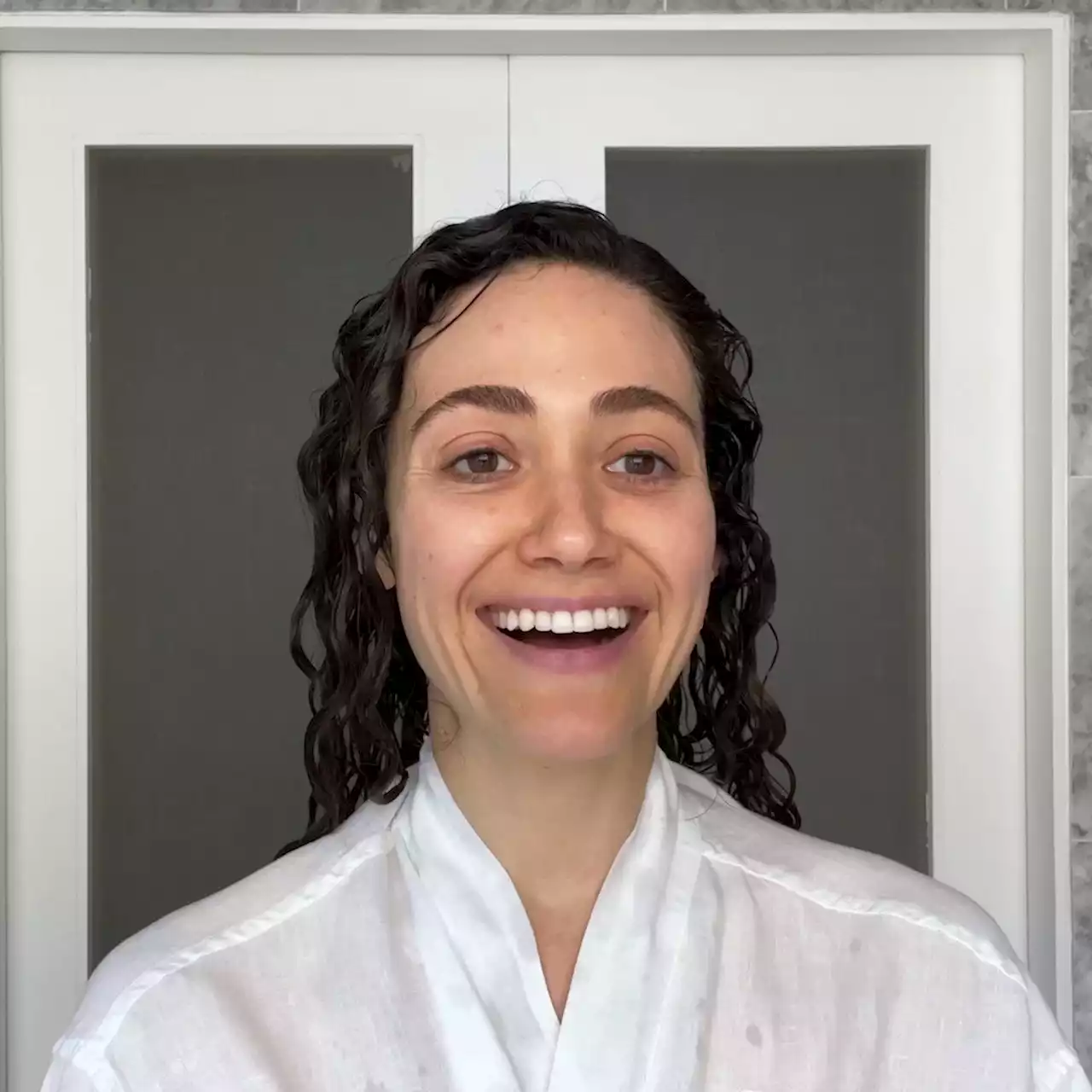 Emmy Rossum Shares Her 28-Step Beauty Routine, From Curly Hair Care to Hydrated Skin